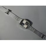 A Gentleman's automatic wrist watch with stainless steel case and strap with crystal decoration,