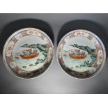A pair of Oriental plates decorated with warriors at sea, approximately 24 cm [d] [2].