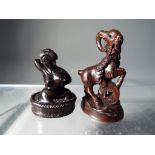Netsuke - two vintage dark wood Japanese netsukes one in a form of a mountain goat type animal,