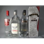 A lot consisting of three 1 litre bottles of vodka to include Smirnoff #21,