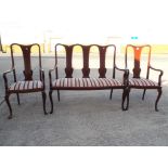 Bergere furniture - a two seater Bergere settee and a pair of matching Bergere carvers with