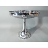 A white metal WMF tazza approximately 21 cm (h)