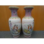 Two large Chinese vases decorated with various figures, bats,