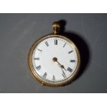A lady's 18 carat gold pocket watch, the case with foliate and floral engraving,