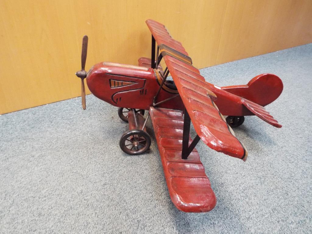A wooden model of biplane approximately 35 cm x 68 cm x 77 cm. - Image 2 of 2