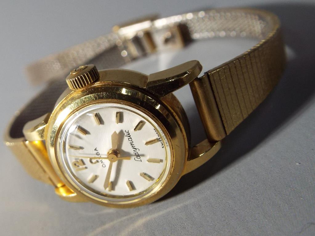 Omega - An 18 carat gold cased Omega Ladymatic cocktail watch,