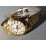 Omega - An 18 carat gold cased Omega Ladymatic cocktail watch,