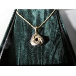 9 carat gold - Lady's 9 carat gold necklace with 9 carat gold pendant, both stamped 375,