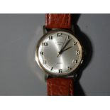 A Gentleman's 9 carat gold cased Rotary wrist watch, Arabic numerals to a silvered dial,