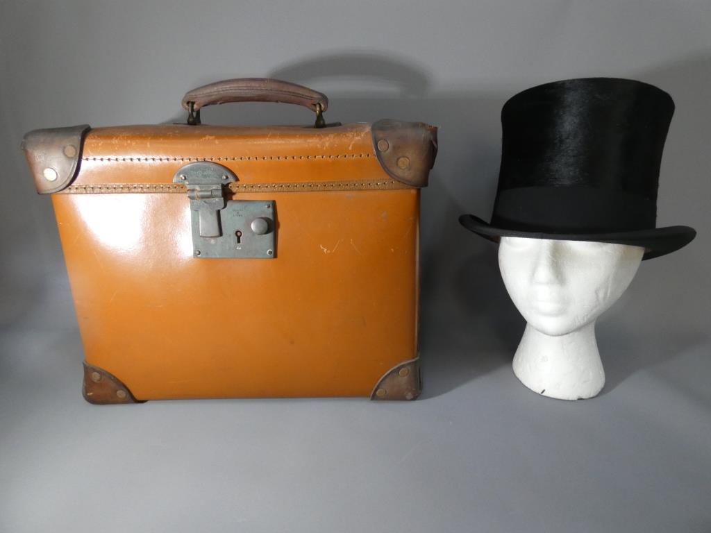 A vintage Lock&Co silk top hat internal circumference approximately 21 inches in Verilite