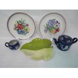 A Poole Pottery floral decoration plate pattern BN and one similar and two pieces of Wedgwood