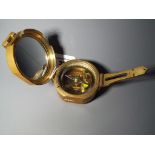 A brass compass, Stanley,