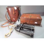 A pair of Barr and Stroud military binoculars with night filters possibly for Naval use and a