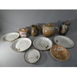 A collection of studio pottery to include Willie Carter Top Farm pottery,