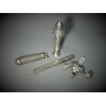 A small quantity of silver hallmarked items to include desk seal, needle case,