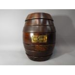 A Remy Martin wooden games compendium in the form of a barrel