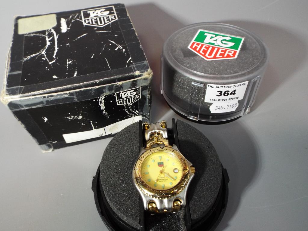 Withdrawn - a gentleman's Tag Heuer 1500 Professional wristwatch with fluorescent hands, date,