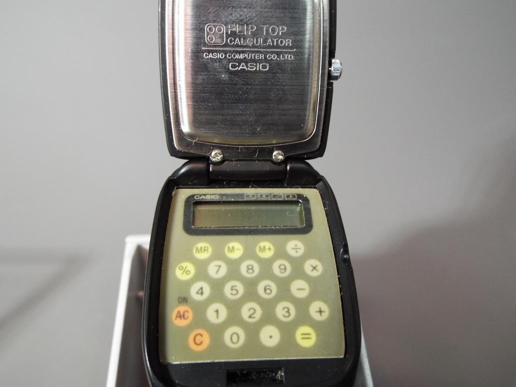 Casio Fliptop - a Casio Fliptop calculator auto power wristwatch in original box with instructions - Image 2 of 4
