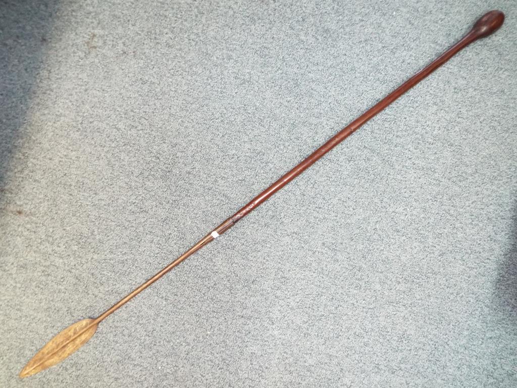 An 18th century Iklwa Zulu spear with knobkerrie at it's end.