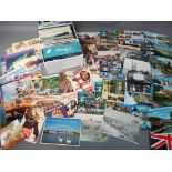Deltiology - a quantity of postcards to include military related, religious, topographical,