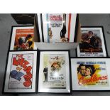 Eight framed reproduction prints of movie posters,