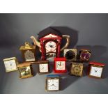 A selection of travel alarm clocks and a