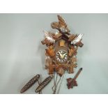 A Black Forest cuckoo clock, wall mounte