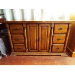 A two door six drawer sideboard, approx