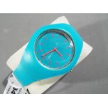 Geneva - an unused modern rubber blue and pink wristwatch by Geneva