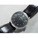 Mercedes Benz - a black modern designer Mercedes Benz wristwatch issued in a limited edition,