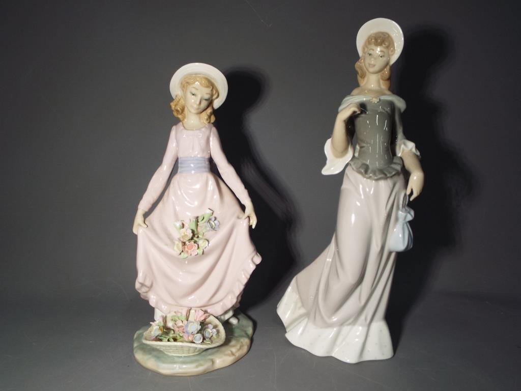 Two Lladro figurines largest approx 28cm (h)