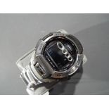 Casio - a Casio G-Shock digital wristwatch with stainless steel strap,