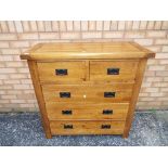 A good quality chest of three over two draws, measuring approximately 98 cm x 98 cm x 43 cm.