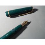 A Parker pen with 14 carat gold nib