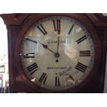 A mid-19th century mahogany longcase clock, 14 inch circular dial with Roman numerals,