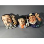 Three large Royal Doulton Toby jugs, one entitled Merlin,