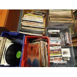 A large quantity of vinyl records (in four boxes) and small quantity of DVDs and CDs [5].