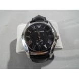 Emporio Armani - a gentleman's designer Emporio Armani wristwatch with black leather strap marked