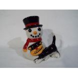 Lorna Bailey - A Lorna Bailey 'Snowman Cat' figure, signed to the base, approximately 12.
