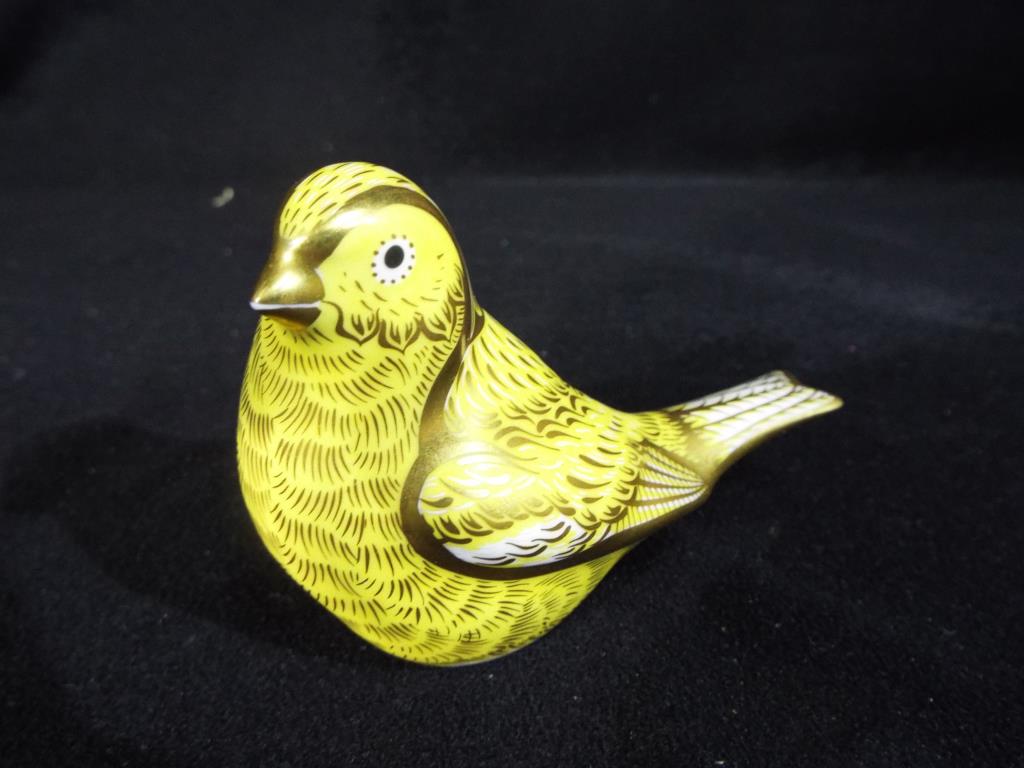 Royal Crown Derby - a Royal Crown Derby figurine depicting a canary, signed in gold pen to the base,