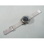A gentleman's stainless steel and chrome modern wristwatch with pedometer,