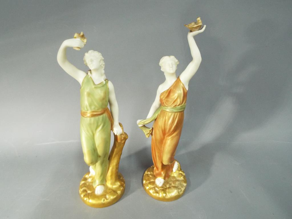 Royal Worcester - a pair of Royal Worcester figurines tallest being approx 26cms (h) Condition: no