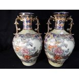 A pair of Oriental vases with bird and floral decoration to the base, approximately 35 cm [H] [2].