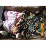 A mixed lot to include a pair of ceramic lady figurines, horse brasses,
