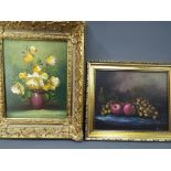 Two framed still life oils, one on canvas depicting fruit, signed lower right by the artist,