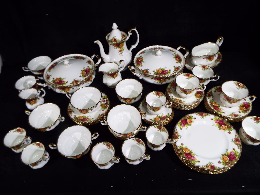 Royal Albert - approximately 58 pieces of tableware decorated in the Old Country Roses pattern to
