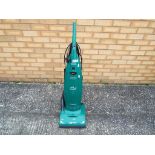 A Hoover Pure Power 1300 W upright vacuum cleaner.