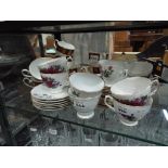 A quantity of dinner and tea ware comprising Royal Vale, Elizabethan and similar.