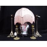 Two pairs of candlesticks and a decorative Oriental table lamp with shade,