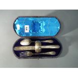 A boxed Victorian flatware with napkin ring, various assay marks, weight 134 g.